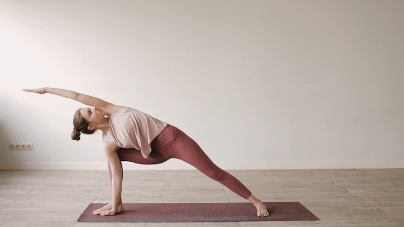 A woman stretching during exercise to reduce stress and relax the body