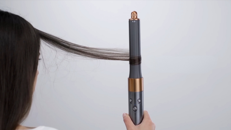 Airflow styler uses high-velocity air to wrap and dry hair without direct contact heat