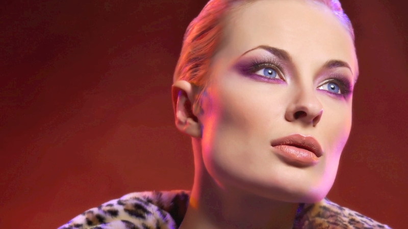 Close-up portrait highlighting strong eye contact and confident expression in portrait photography