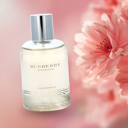Burberry Weekend for Women perfume bottle on a soft pink floral background