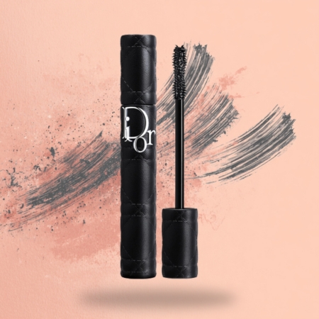 Black mascara tube and wand with a dense brush designed to add intense volume