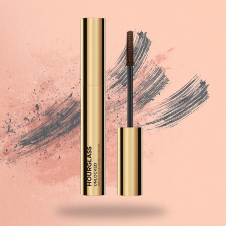 Gold mascara tube and wand with slim brush designed for precise length and separation