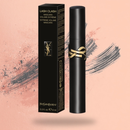 Black mascara tube with gold logo alongside its packaging, designed for high-volume lashes